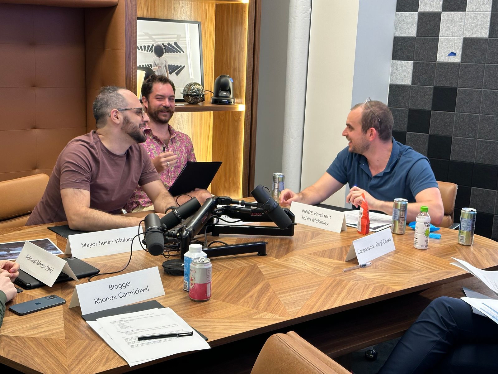 A group of entrepreneurs playing local and federal officials debate the future of America