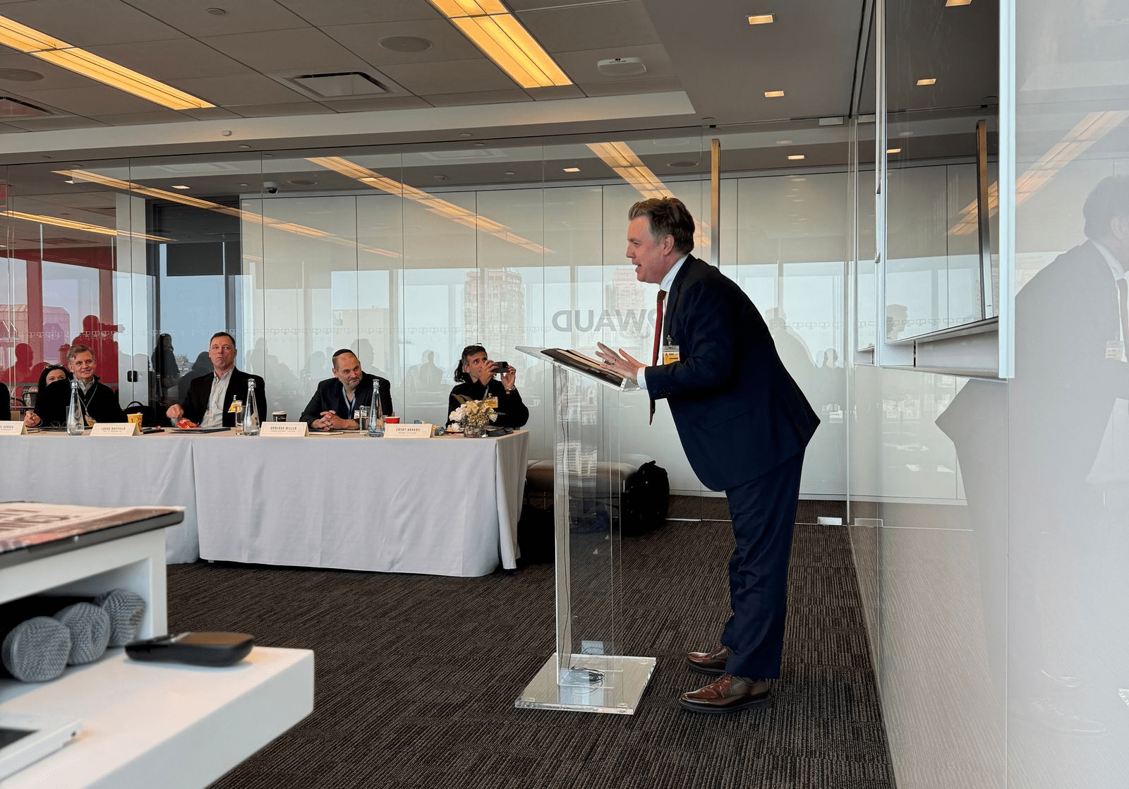President Chuck Branner demands greater automation of the U.S. government and national security during a riskgaming runthrough of “No Man’s Land” at Bloomberg HQ. Photo by Danny Crichton.